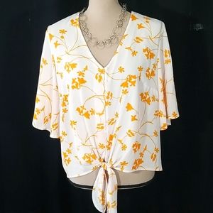 Lush V neckline button down pattern top. Size M
